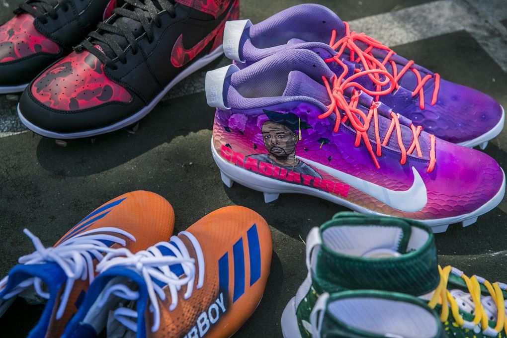 A cleat design inspired by Kanye West’s ‘Graduation’ album made by Andrew Urrutia. (Amanda Snyder / The Seattle Times)