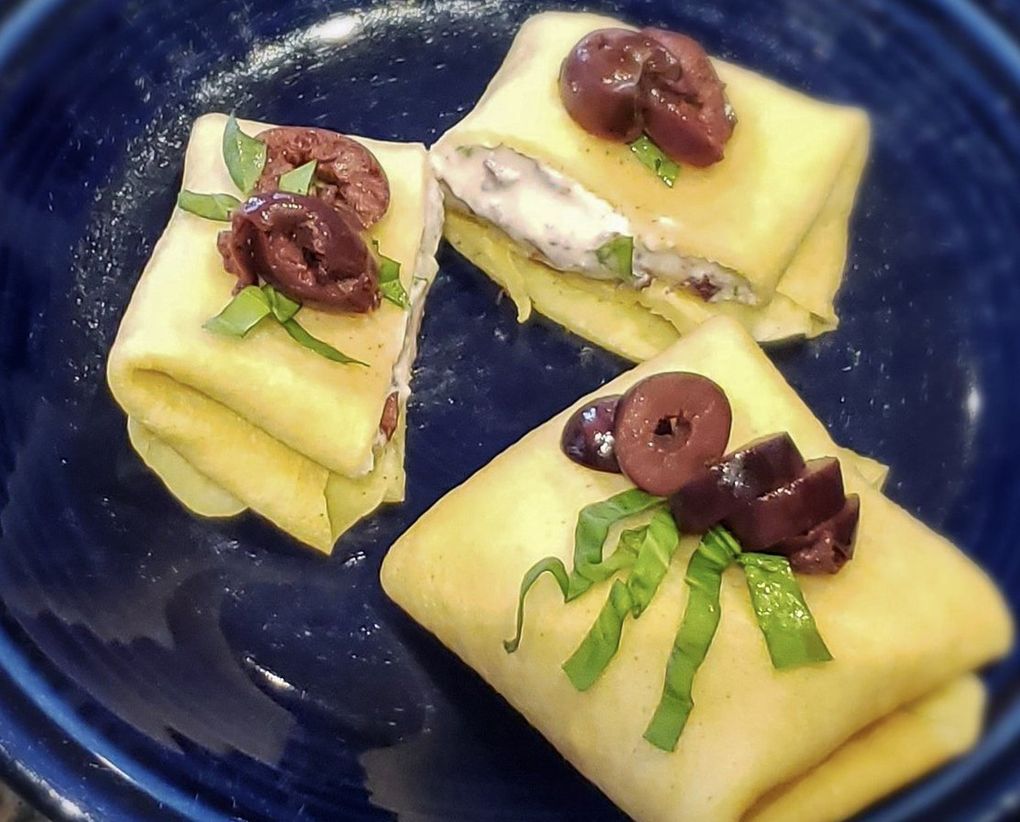 Lynn Fischer, from Woodinville, was one of several readers who used pancake batter to make crêpes, but she elevated her crêpes into blintzes, filling the little blankets with goat cheese, basil, honey, orange zest and Kalamata olives. (Lynn Fischer)