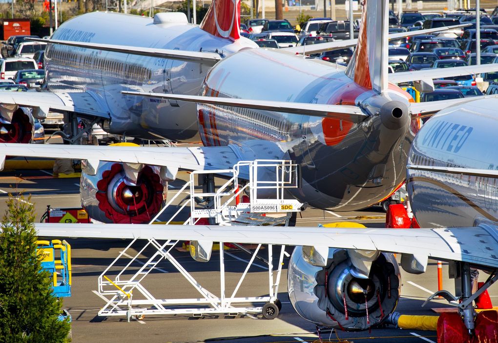 Some of about 60-737 MAX airplanes share a parking lot between East Marginal Way South and the Duwamish Waterway across the street from Boeing Field in Seattle on February 20, 2020. 213077 (Mike Siegel / The Seattle Times)