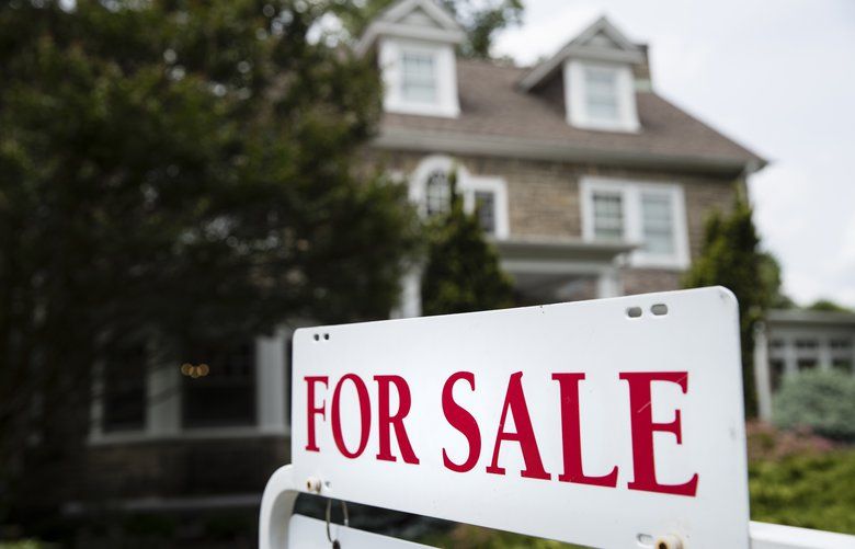 FILE- In this June 8, 2018, file photo a for sale sign stands in front of a house, in Jenkintown, Pa.  . (AP Photo/Matt Rourke, File) NYBZ601 NYBZ601