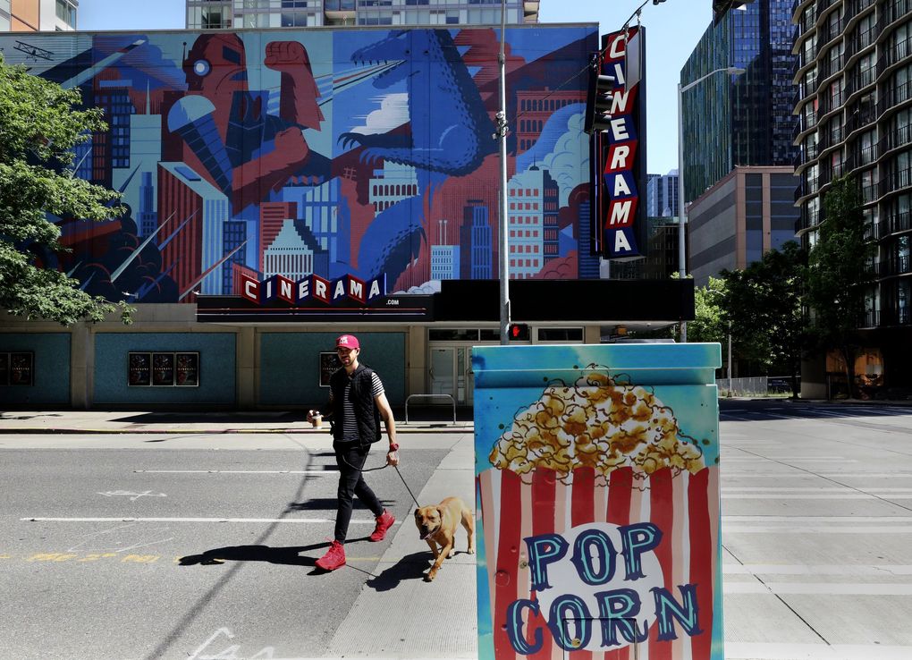 The Cinerama movie theater opened in 1963, eventually fell into disrepair, and then was restored to its former glory and stocked with movie memorabilia in the late 1990s. (Alan Berner / The Seattle Times)