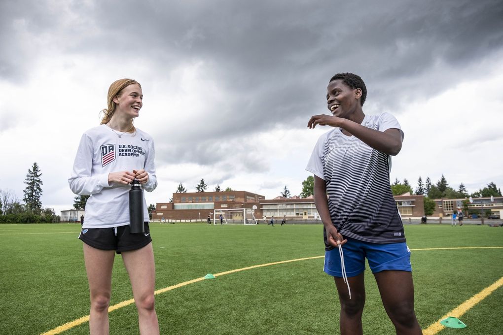 Lughano Nyondo is a 15-year old soccer star in her native Malawi, and she met Ruby Settle in France. Nyondo was visiting Settle in Seattle on her way to accepting a scholarship in Connecticut. But when the pandemic hit she was stuck in Seattle. Settle’s family has taken her in and helped her in continuing her training.
Photographed Thursday, May 21, 2020 214032 (Dean Rutz / The Seattle Times)