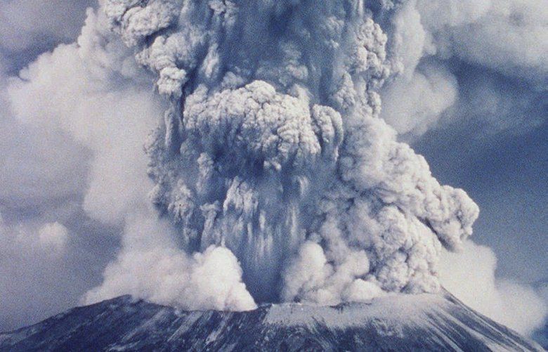 Mount St. Helens in Washington State erupts May 18, 1980, with a fury more powerful than the atomic bomb that leveled Hiroshima. Hot volcanic ash spewed 60,000 feet into the air and turned day into night as the ash fell to the ground. Never before had a volcano erupted in an industrialized country in the middle of a major population center. This photo is one of a series of photos that won a Pulitzer Prize in 1981 in the General News category.  (AP Photo/The Daily News, Roger Werth) MANDATORY CREDIT

12/26/99 — Glimpses of a Northwest Century 
Mount St. Helens had been Washington’s most recently active volcano when it rumbled alive again with internal forces in March 1980. By May its northwest side was bulging ominously. On May 18, at 8:32 a.m., it erupted. The top 2,400 feet of the mountain were destroyed in an explosion that rattled windows as far away as Vancouver, B.C. Wind-borne ash fell thickly in Eastern Washington, disrupting transportation, agricultures and lives for weeks. Fifty-seven people died in the eruption.