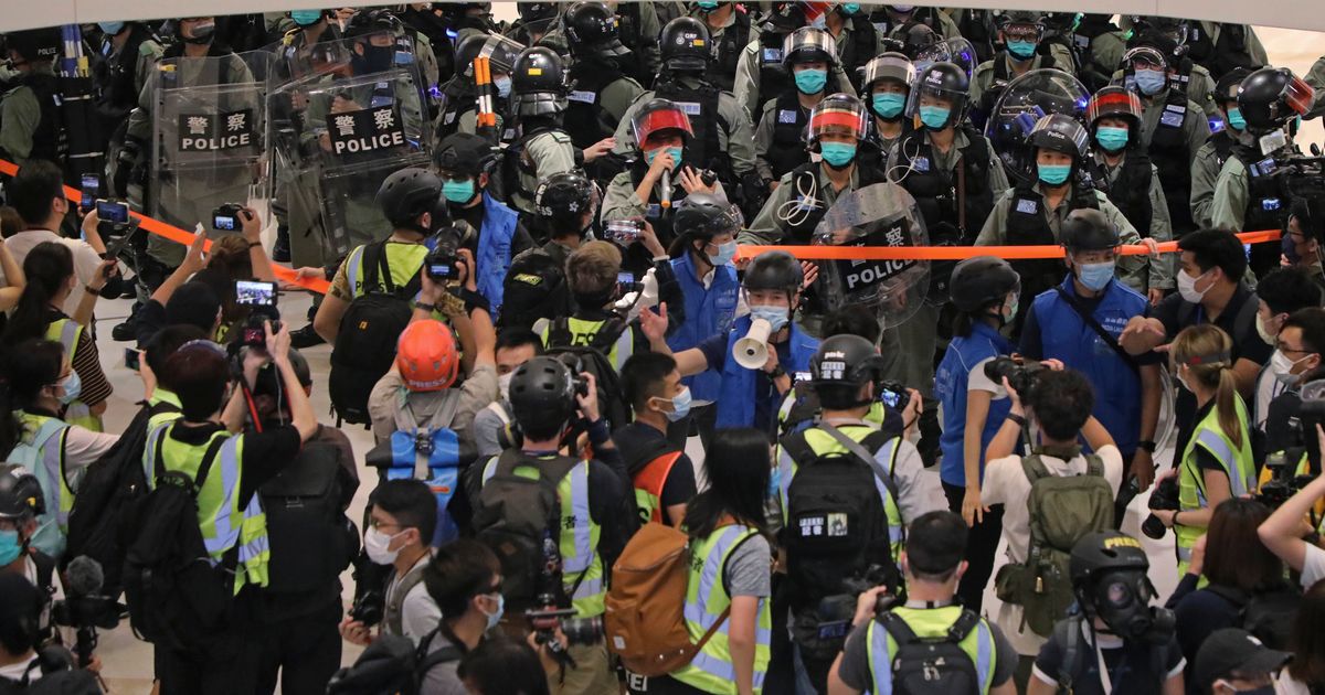 Hong Kong police use pepper spray to clear May Day protest The