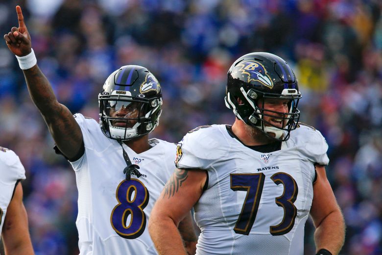 Baltimore Ravens quarterback Lamar Jackson (8) celebrates after a