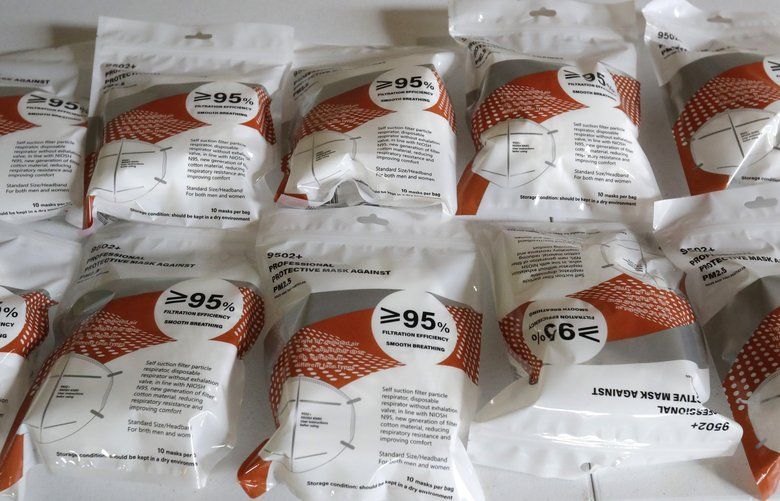 Packages of KN95 protective face masks are show after being donated by Pro Insurance Consultants to Miami-Dade Transit employees during a news conference at Dadeland South Station, Friday, April 24, 2020, in Miami. Miami-Dade County continues to be the state’s coronavirus epicenter with a third of the state’s confirmed cases. (AP Photo/Wilfredo Lee) FLWL103