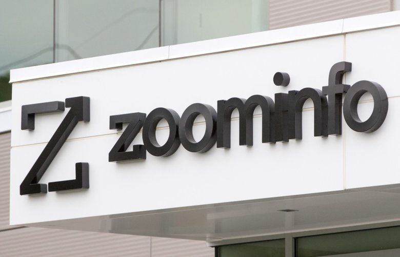 Signage is displayed on the ZoomInfo Technologies Inc. headquarters in Waltham, Massachusetts, U.S., on Wednesday, June 3, 2020. ZoomInfo increased the price range for its upcoming initial public offering, aiming to raise as much as $890 million in the listing. Photographer: Scott Eisen/Bloomberg 775519546