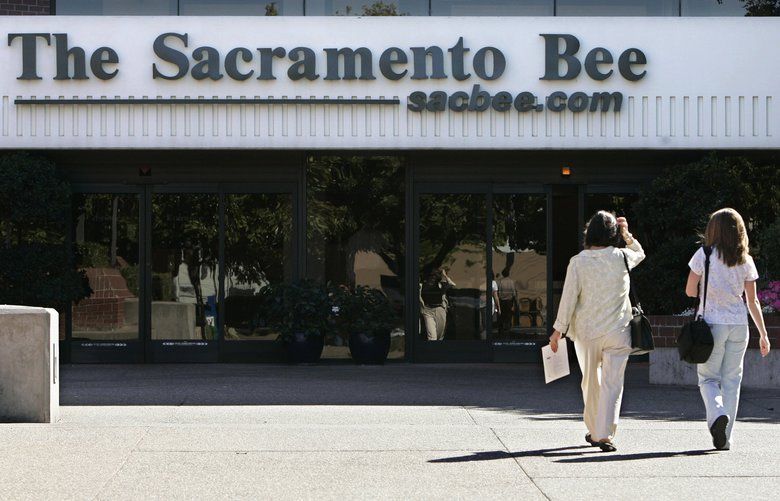 FILE – In this Aug. 25, 2008, file photo, people walk into the Sacramento Bee newspaper building in Sacramento, Calif. The publisher of the Miami Herald, The Kansas City Star, The Sacramento Bee and dozens of other newspapers nationwide is filing for bankruptcy protection. McClatchy said Thursday, Feb. 13, 2020, it will continue to run normally as it pursues approval of its restructuring plan under Chapter 11. The publisher’s origins date to 1857 when it first began publishing a four-page paper in Sacramento, California, following the California Gold Rush. That paper became The Sacramento Bee. (AP Photo/Rich Pedroncelli, File) FX403
