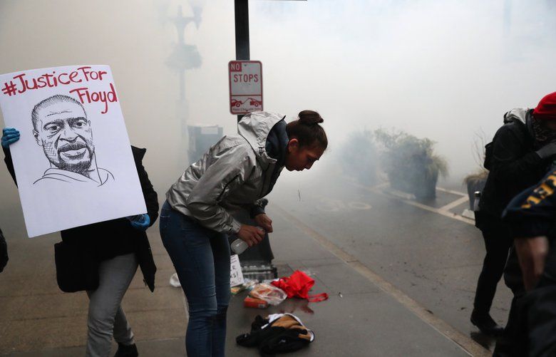 Judge bars Seattle police from using tear gas, force against nonviolent ...
