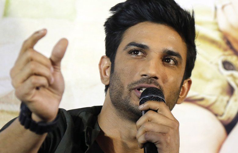 FILE- In this May 30, 2017 file photo, Bollywood actor Sushant Singh Rajput speaks during a press conference to promote his  movie “Raabta” in Ahmadabad, India. Rajput was found dead at his Mumbai residence on Sunday, Press Trust of India and other media outlets reported. (AP Photo/Ajit Solanki, File) IBA101 IBA101