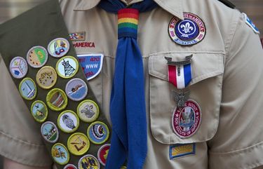 FILE — An Eagle Scout, who is openly gay, in the annual Gay Pride March in New York, June 29, 2014. The Boy Scouts of America said this week that the organization would create a “diversity and inclusion” merit badge and make earning it a requirement of becoming an Eagle Scout, the highest scouting rank. The nonprofit also joined a growing number of organizations announcing public support for racial equality and the Black Lives Matter movement. (James Estrin/The New York Times) XNYT126 XNYT126