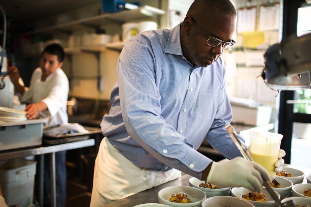 Café Campagne chef/owner Daisley Gordon — seen here in a photo from our pre-coronavirus archive — can make you a dinner that feels like a special treat, even if you eat it out of a to-go box. (John Lok / The Seattle Times)