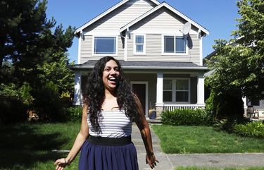 DACA recipient Alejandra Pérez is in a joyous mood Thursday, June 18, 2020 in Kent after being stunned by Thursday’s Supreme Court ruling saying President Trump did not end the program properly. In the background is the house Pérez owns with her brother, another DACA recipient. 214288