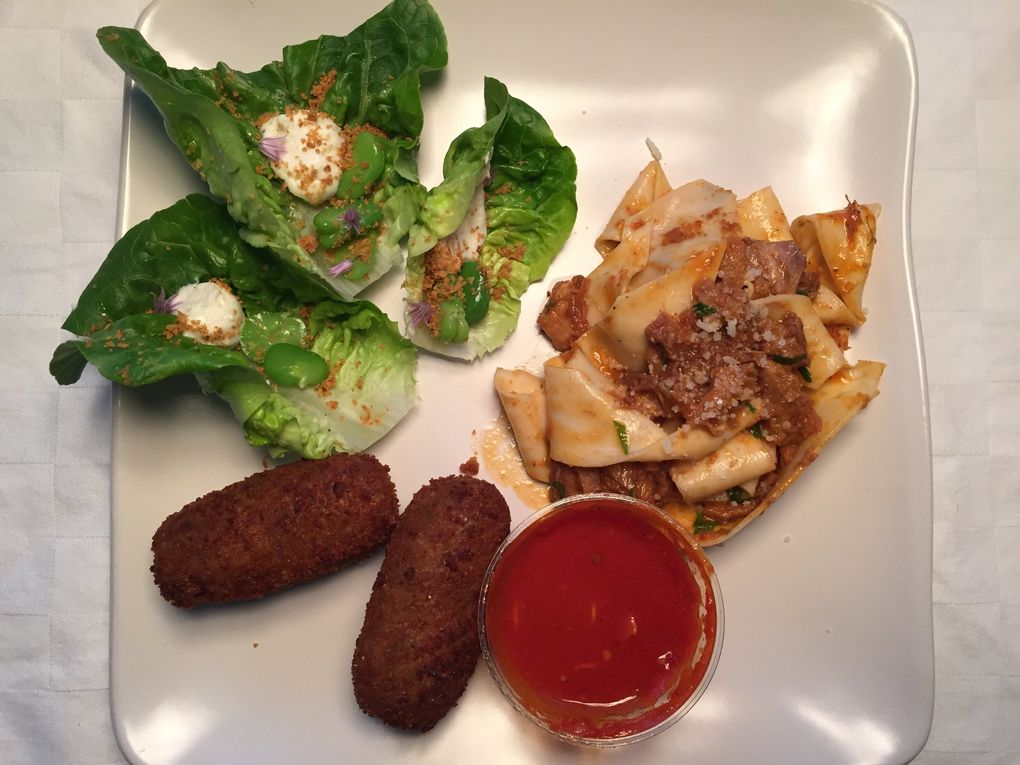 From Carrello to-go, a superlative salad, excellent pappardelle and the croquettes known as supplì al telefono. (Bethany Jean Clement / The Seattle Times)