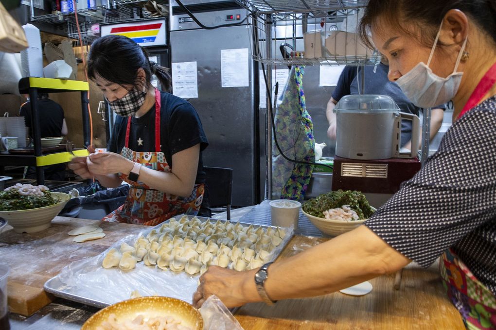 Dumplings are made in the kitchen of Dumpling the Noodle in Wallingford.
Dumpling the Noodle is a restaurant that boasts a tasty dumpling that our food writer found irresistible as he sampled the Seattle area’s best.
(Dean Rutz / The Seattle Times)