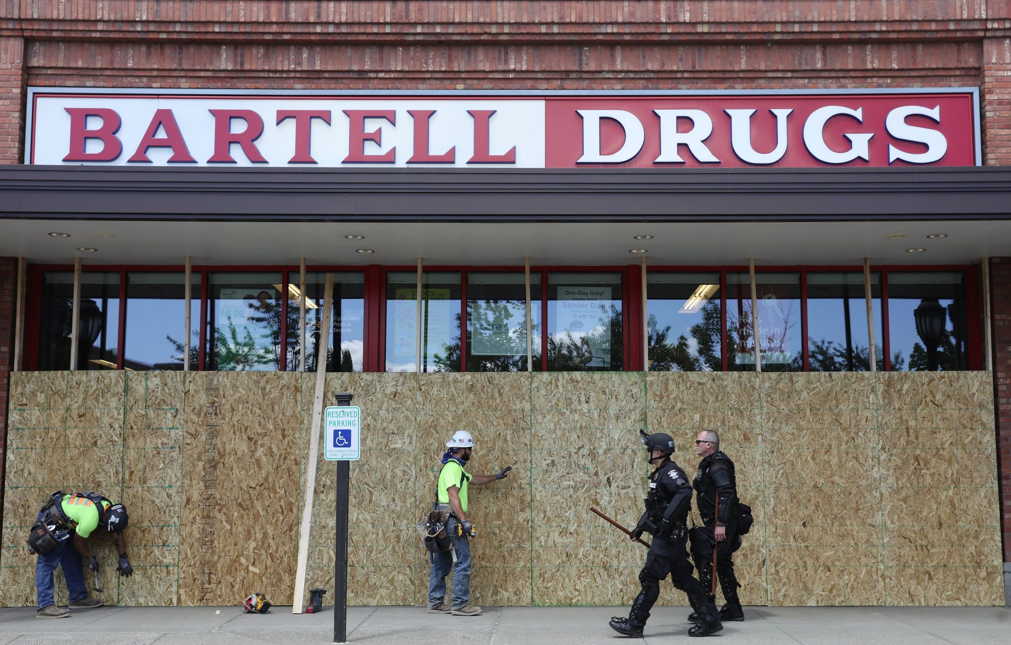 An abundance of caution': Across U.S., city storefronts boarded up