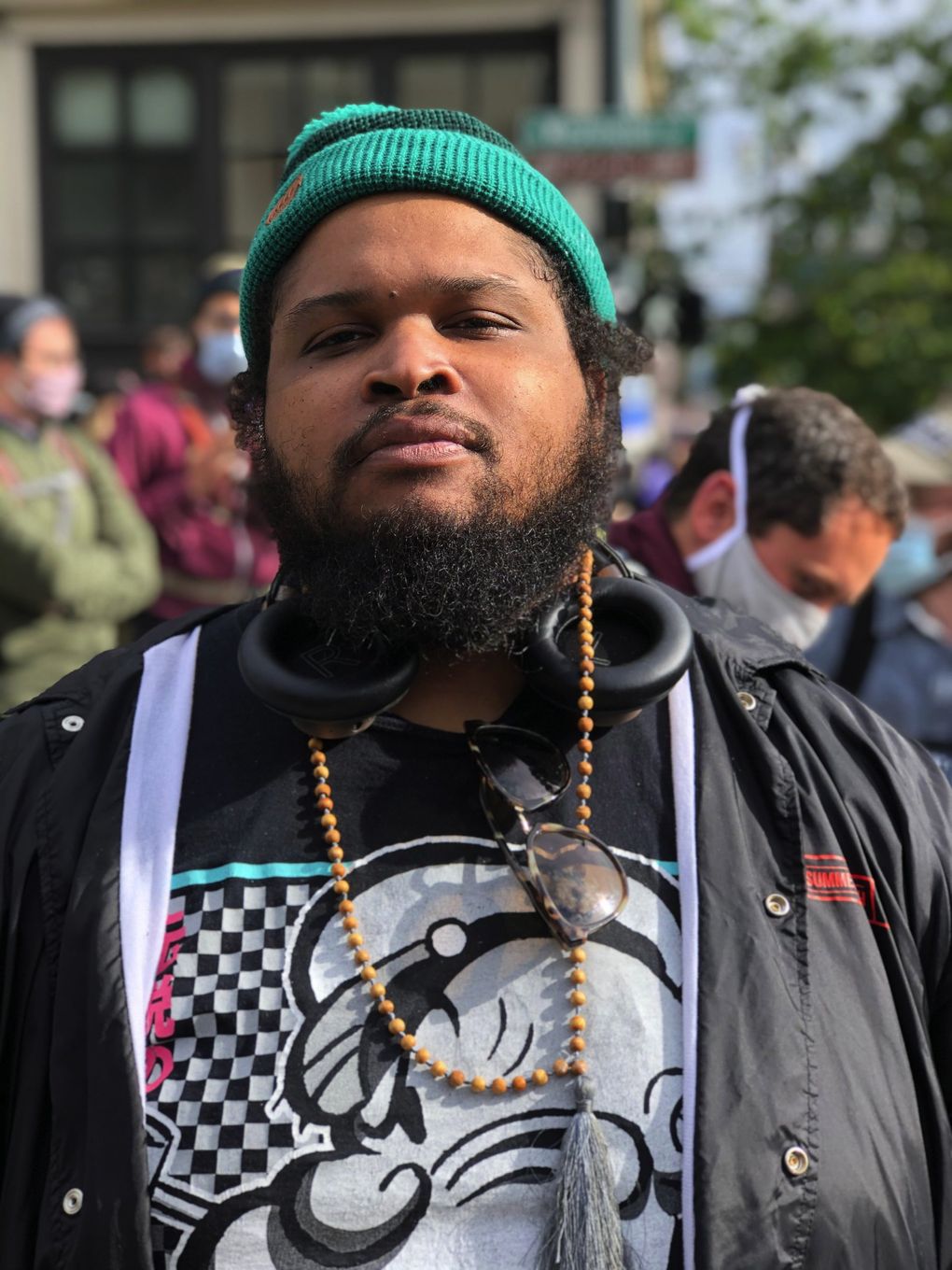 William Parham was among the demonstrators Tuesday in Seattle. He said he’s been protesting every night except for Sunday. (Paul Roberts / The Seattle Times)