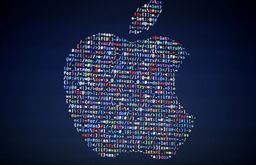 FILE – In this June 13, 2016, file photo, the Apple logo is shown on a screen at the Apple Worldwide Developers Conference in San Francisco.  (AP Photo/Tony Avelar, File)
