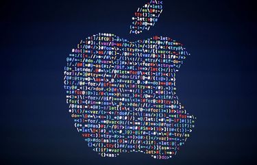 FILE – In this June 13, 2016, file photo, the Apple logo is shown on a screen at the Apple Worldwide Developers Conference in San Francisco. (AP Photo/Tony Avelar, File)