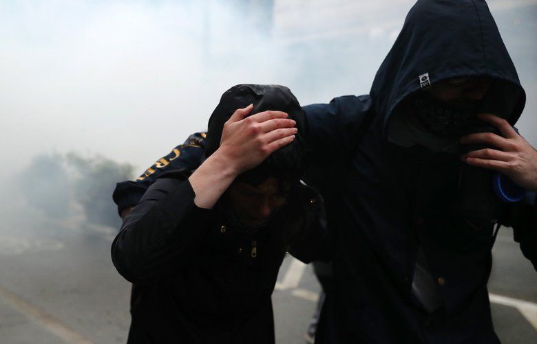 Seattle City Council bans police use of tear gas and chokeholds as ...
