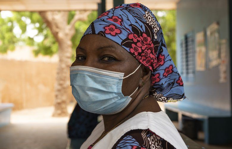 In a photo from UNICEF, Hawa Hamadou, a health worker, at the Gamkale health center in Niamey, Niger, May 26, 2020. Hamadou said she has seen a drop in visits by mothers, who are afraid to bring their children for immunizations. (UNICEF via The New York Times) — NO SALES; FOR EDITORIAL USE ONLY WITH NYT STORY VIRUS OTHER DISEASES BY JAN HOFFMAN FOR JUNE 14, 2020. ALL OTHER USE PROHIBITED. —