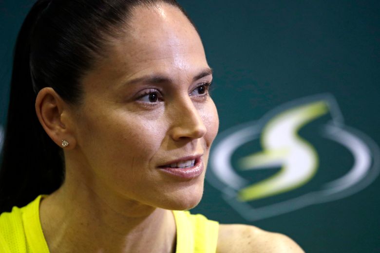 In this Monday, May 13, 2019, file photo, Seattle Storm’s Sue Bird talks with media members at the basketball team’s media day in Seattle.  (AP Photo/Elaine Thompson, File)