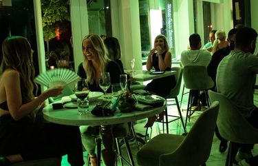 Diners at a restaurant in Houston, on Wednesday, June 25, 2020. The state will allow businesses that have already reopened to continue operating, but will pause further phases of reopening due to a surge in cases of the coronavirus. (Erin Trieb/The New York Times) XNYT60