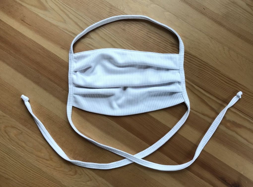 This cloth mask, made by Califorina rowing company SewSporty, is constructed from two layers of bamboo white ash polyester blend fabric. Because it’s a more lightweight option than a surgical mask – and more structured than a buff – it’s well suited to outdoor activities like running. (Megan Burbank / The Seattle Times)