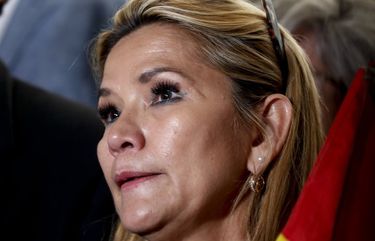 FILE – In this Nov. 11, 2019, file photo, then senate second Vice President and now Bolivian Interim President Jeanine Anez arrives at Congress in La Paz, Bolivia. Interim President Anez has announced on Thursday, July 9, 2020, that she has tested positive for COVID-19. (AP Photo/Natacha Pisarenko, File) XLAT141 XLAT141
