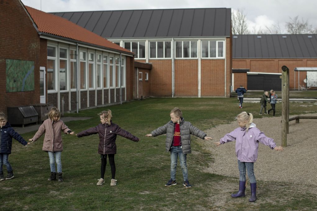 Children check their distancing after a recess in Logumkloster, Denmark, in April. Denmark was the first country in the Western world to reopen its elementary schools after the start of the coronavirus pandemic. (Emile Ducke / The New York Time, file)