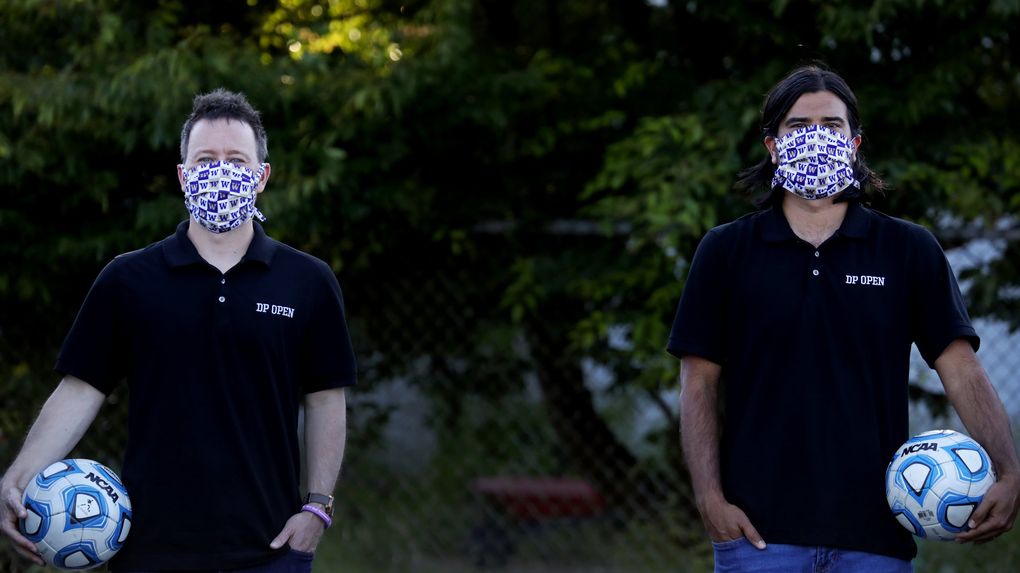 Adam Lang, left; and Taylor Hoss, right, seen Monday, July 13, 2020, helped organize an annual charity golf tournament – the DP Open – to honor their teammate University of Washington soccer player Daniel Phelps, who died in his sleep of sudden cardiac arrest in 2015. 214471 (Ken Lambert / The Seattle Times)