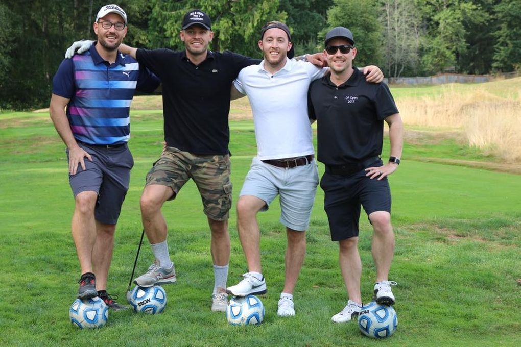 Participants pose at the “soccer hole” – where the object is to kick a soccer ball into a small goal to take a stroke off your final score – at the DP Open. (Courtesy of / Adam Lang)
