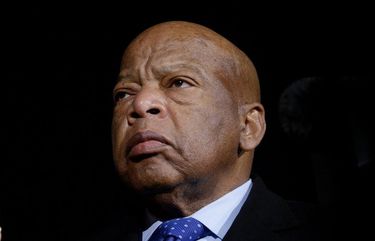 U.S. Rep. John Lewis (D-GA) holds a candle during an event to address President Donald Trump’s executive orders on January 30, 2017, in front of the Supreme Court in Washington, D.C. (Olivier Douliery/Abaca Press/TNS) 1718866 1718866