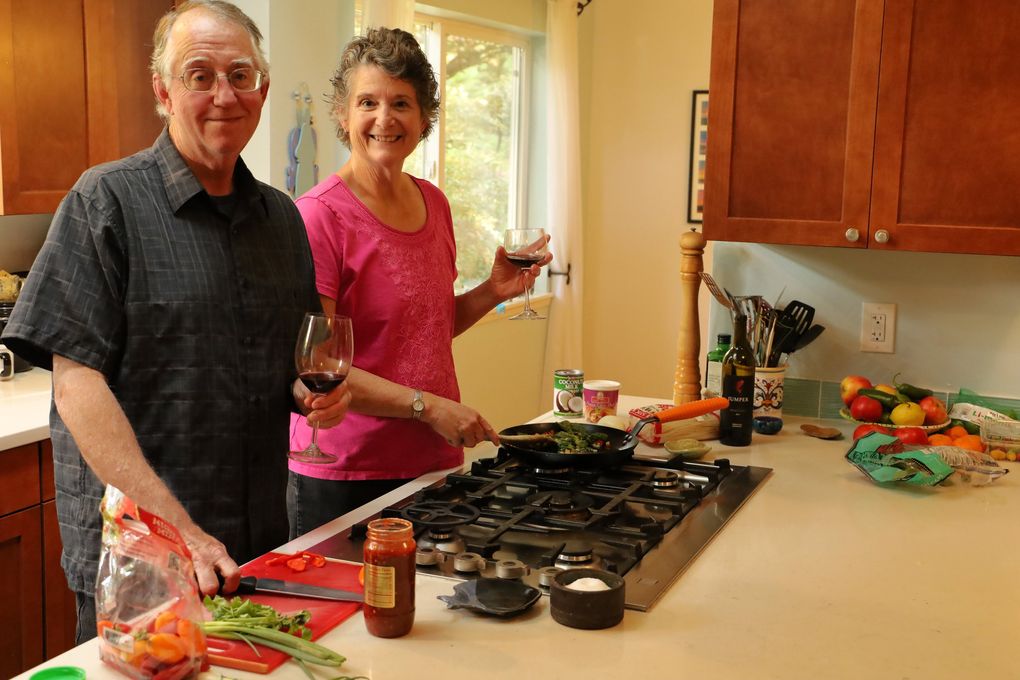 Steve Venard and Cathy Martin, pictured here in their kitchen in Shoreline, enjoy making up new dishes. The catch? They never cook with recipes, choosing instead to make everything up as they go along. So it’s always difficult for them to re-create their dishes exactly. (Roy Jensen)