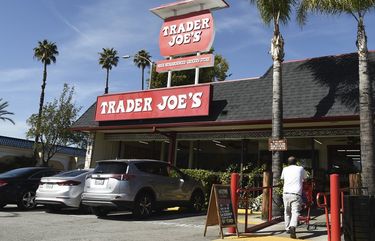 FILE – In this Feb. 26, 2020, file photo, the original Trader Joe’s grocery store in Pasadena, Calif., is viewed. Responding to calls for Trader Joe’s to stop labeling its international food products with ethnic-sounding names, the grocery store chain said it has been in a yearslong process of repackaging those products and will soon complete the work. (AP Photo/Chris Pizzello, File) NY905 NY905