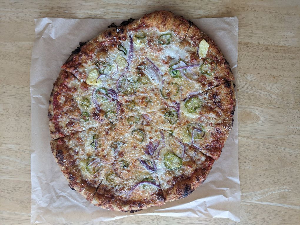 Moon pizza began popping up at Sea Wolf Bakers and is a vibrant member of Seattle’s burgeoning pizza scene. (Jackie Varriano / The Seattle Times)