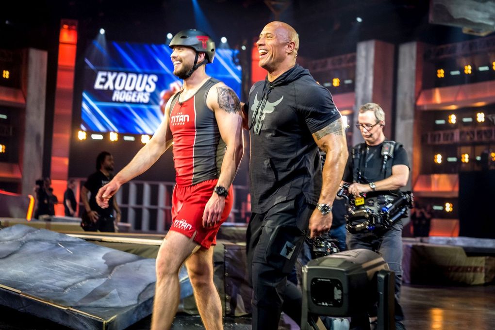 Mitch Harrison, left, and Dwayne Johnson in NBC’s “Titan Games.” (Hiram Garcia / NBC)