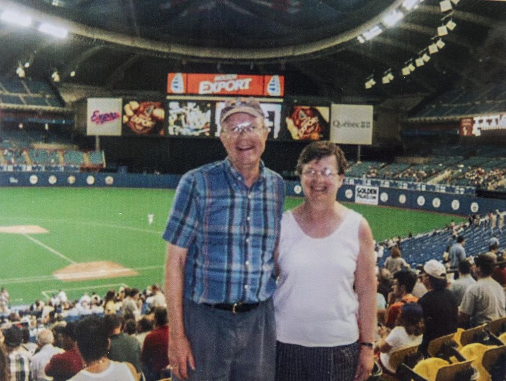 In a photo out of their major league scrapbook, Jim and Andrea Siscel pose in the Montreal Expos’ Olympic Stadium in 2003. (Steve Ringman / The Seattle Times)