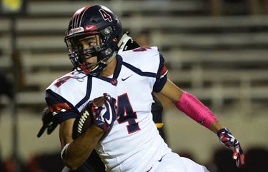 Memorial’s Jalen Mcmillan takes the ball down field for a first down on a pass over the middle during their game against Edison at Ratcliffe Stadium in Fresno on Friday, Oct. 12, 2018.  B7312949502Z.1