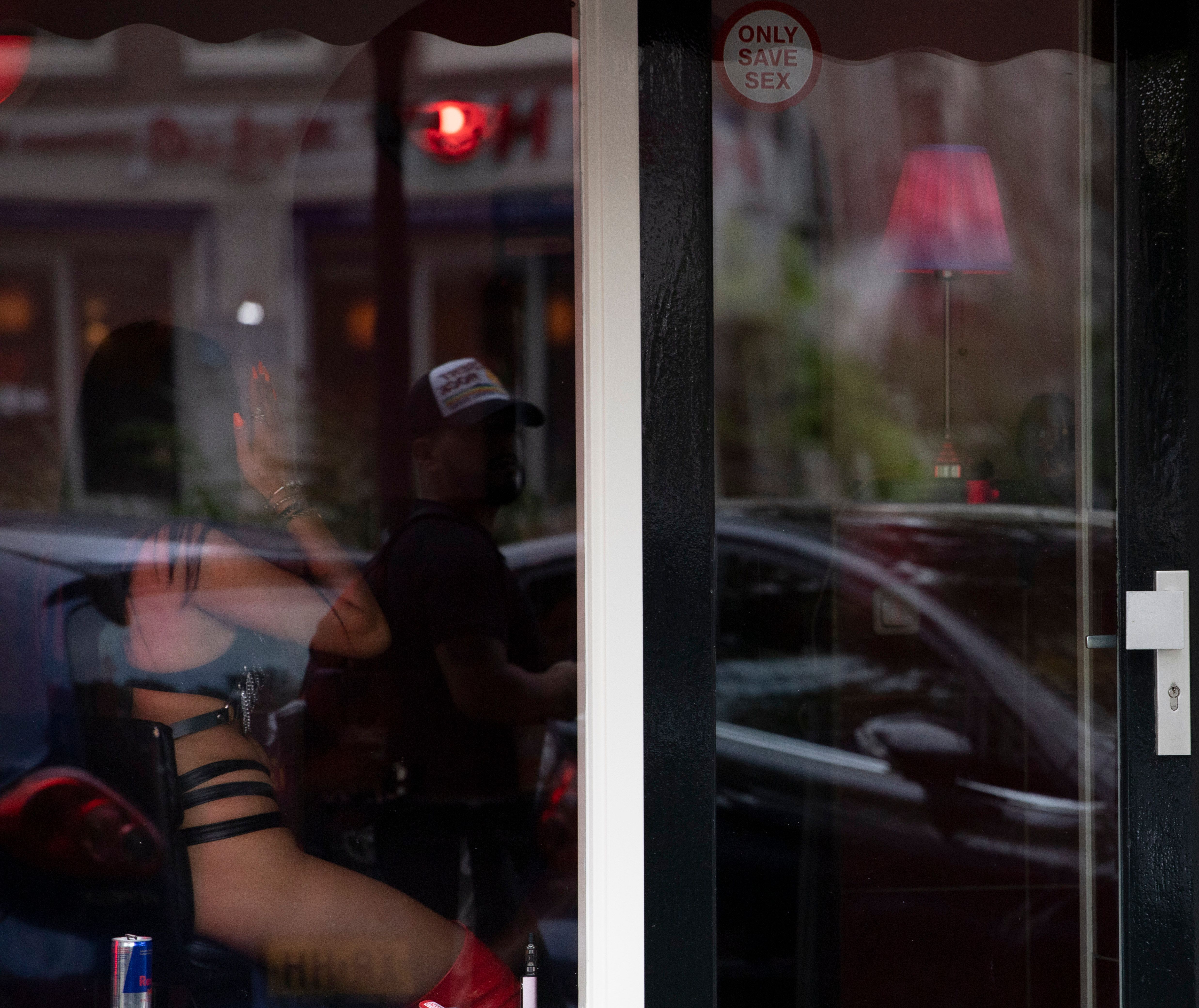 Amsterdam s red light district emerges from lockdown The Seattle