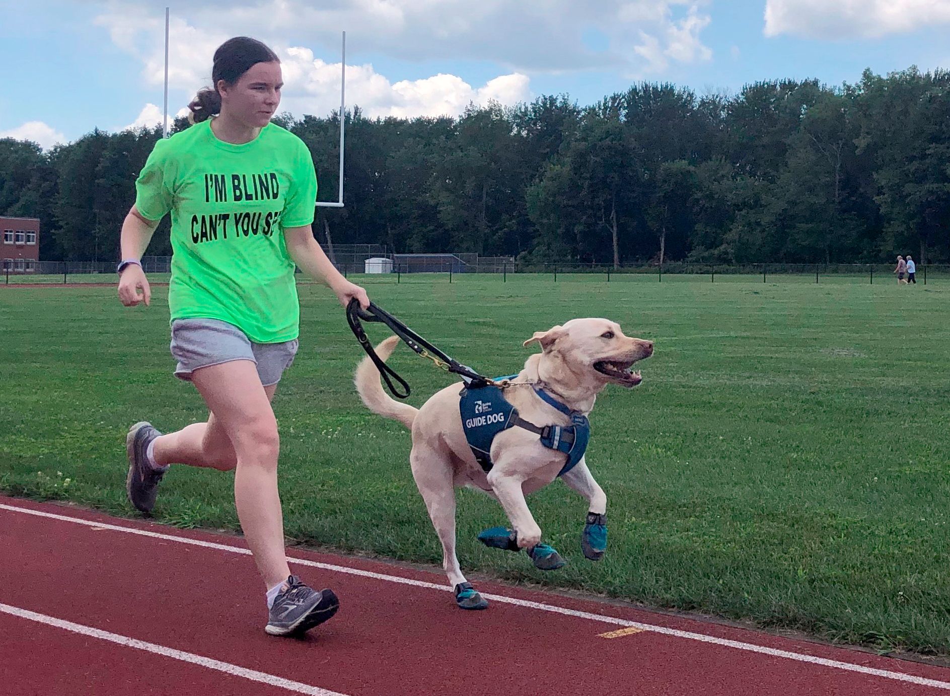 Guide dogs helping blind runners stay fit despite pandemic The