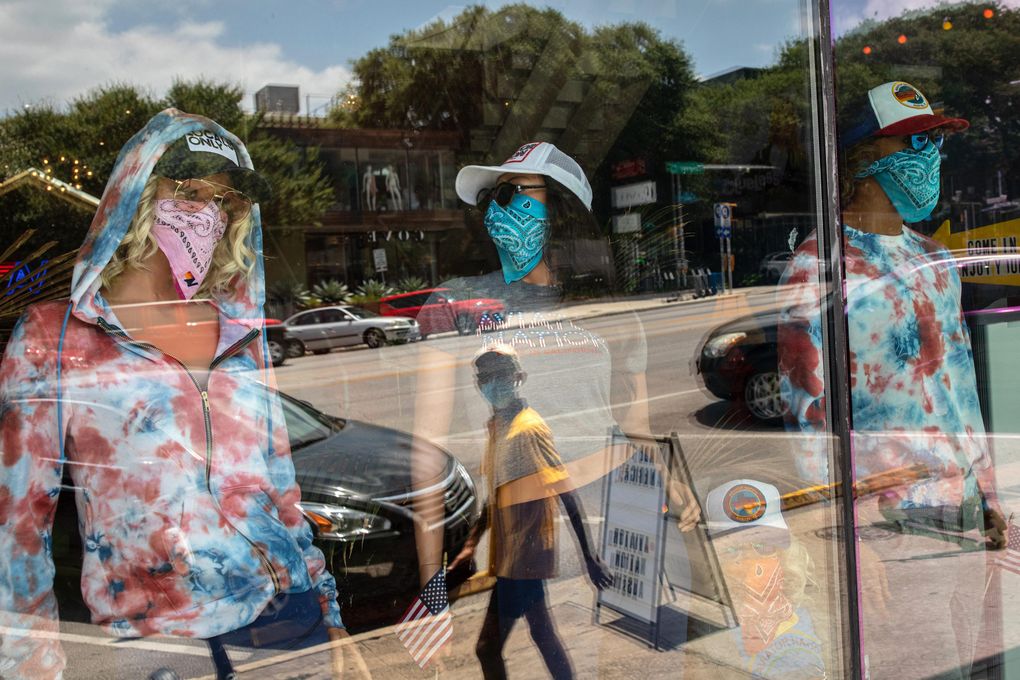 Mask-wearing mannequins at a store in Austin’s South Congress neighborhood. Texas is among the states that have rolled back their reopenings amid a spike in coronavirus cases. Florida also reversed course on loosened restrictions after Gov. Ron DeSantis, a Republican, pushed for a quick recovery. (Photo by Tamir Kalifa for The Washington Post).