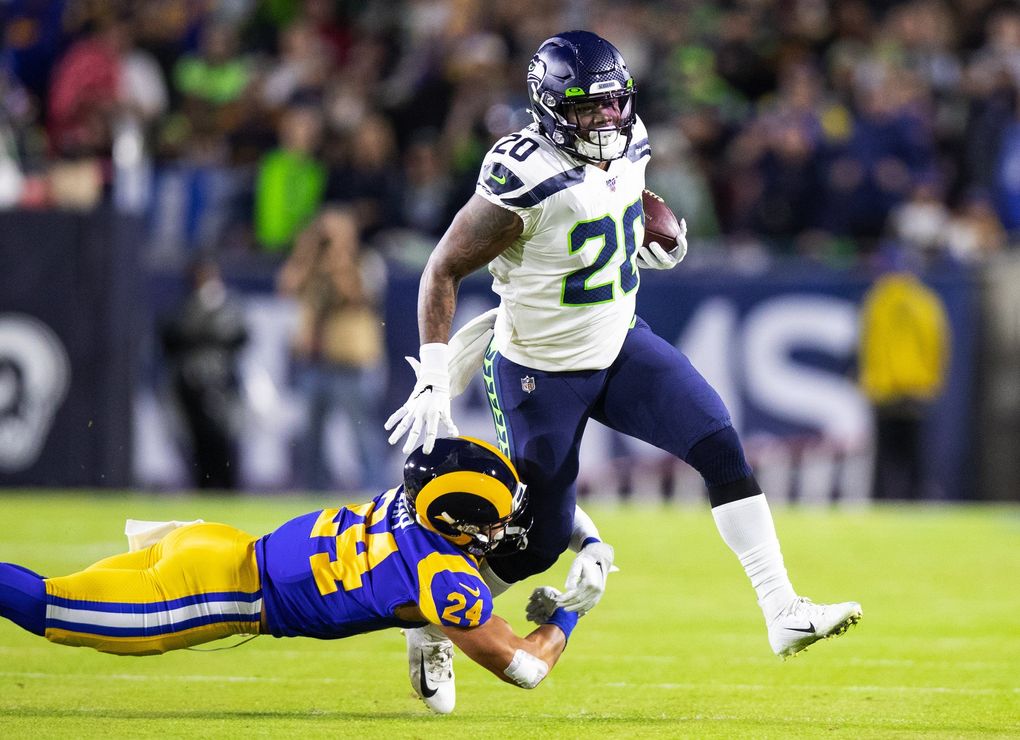 Seattle Seahawks running back Rashaad Penny is injured on this first quarter play during a game against the Los Angeles Rams on December 8, 2019. (Mike Siegel / The Seattle Times)