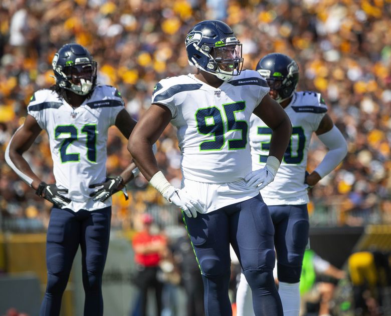 Seattle Seahawks defensive end L.J. Collier, (95), poses for a