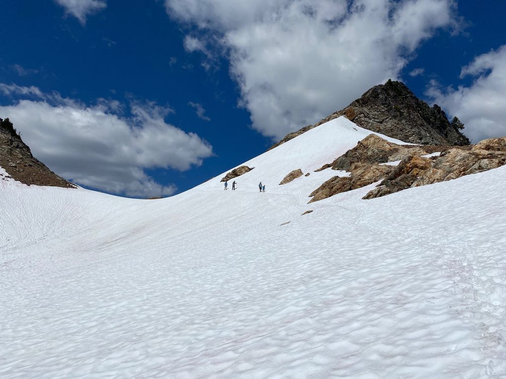Hikers descending from Spider Gap on Spider Glacier. (Rick Lund / Special to The Seattle Times)