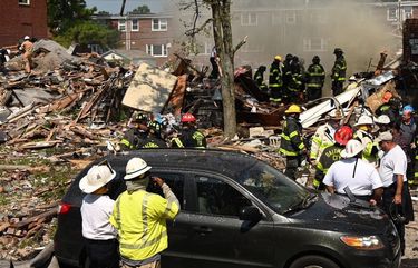 Firefighters at the scene of an explosion in Northwest Baltimore on Aug. 10, 2020, which killed one person and injured several others. (Jerry Jackson/Baltimore Sun/TNS)  1738854 1738854