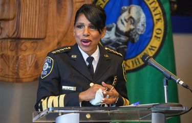 Seattle police Chief Carmen Best started Tuesday’s press conference at City Hall with a smile. Later, she said, “This was a decision I wrestled with, but it’s time.” (Steve Ringman / The Seattle Times)