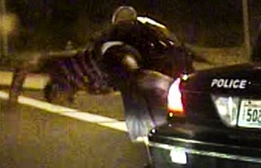 A still from a video shows former Tukwila police officer Nick Hogan used an unsanctioned takedown against Alvin Walker in 2011, breaking Walker’s elbow. Hogan was fired after multiple investigations found he violated department policy, and later pleaded guilty to violating a suspect’s civil rights, but he retained his state certification.