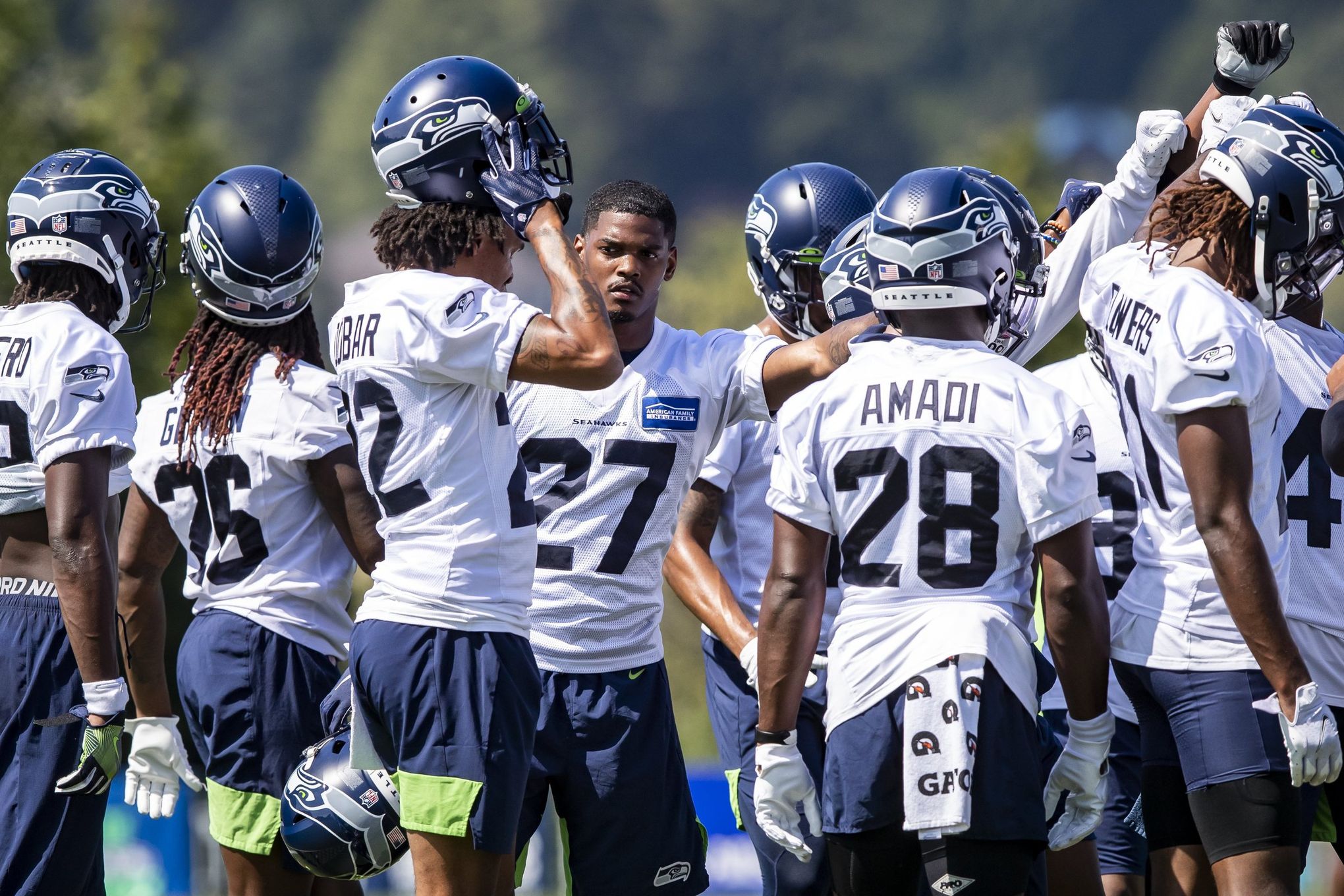 Seahawks open training camp with attention on defense's potential