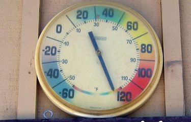 A thermometer at Furnace Creek Ranch in Death Valley on July 17 shows the midafternoon temperature, which topped out at 128. Illustrates TRAVEL-DEATHVALLEY (category t), by John Deiner ? 2005, The Washington Post. Moved Tuesday, Aug. 9, 2005. (MUST CREDIT: Washington Post photo by John Deiner.)